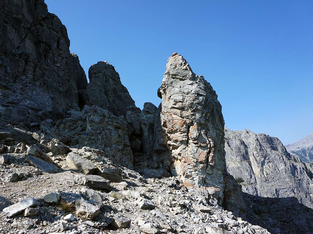 Find the path to the summit of Mt Yamnuska Looking ahead at the first rock seam