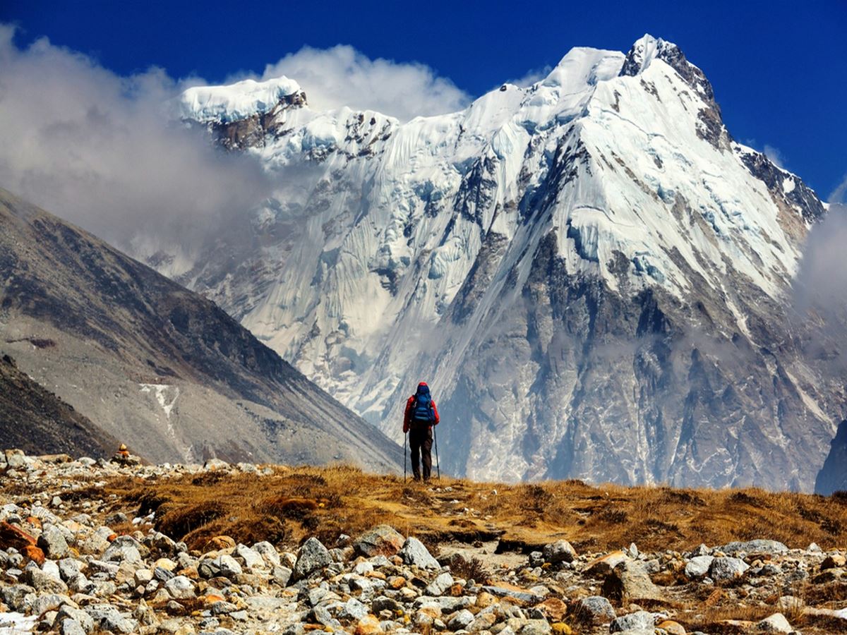 Male hiker in Himalayas mountain while on the guided Annapurna circuit trek