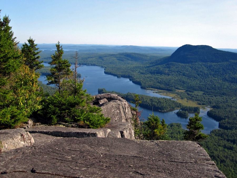Looking down on the lake from Appalachian Trail in Maine which is one of America’s 10 Best Backpacking Trips
