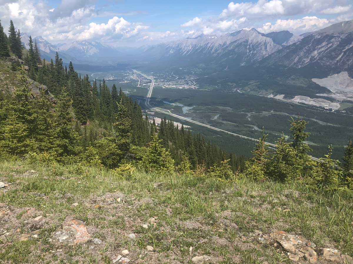 View from the ridge down into Canmore on the Wind Ridge hike in Canmore, Alberta