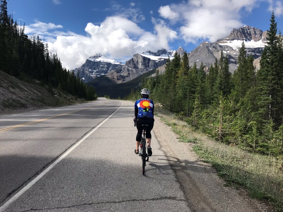 Biker on a cycling tour from Bow Pass to Lake Louise