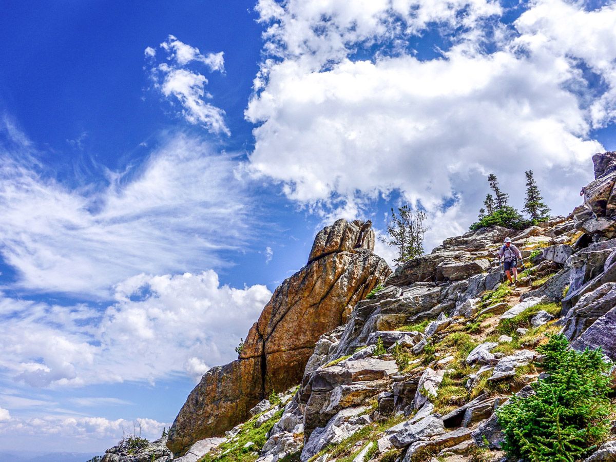 Man hiking at Amphitheater Lake Hike Grand Teton National Park