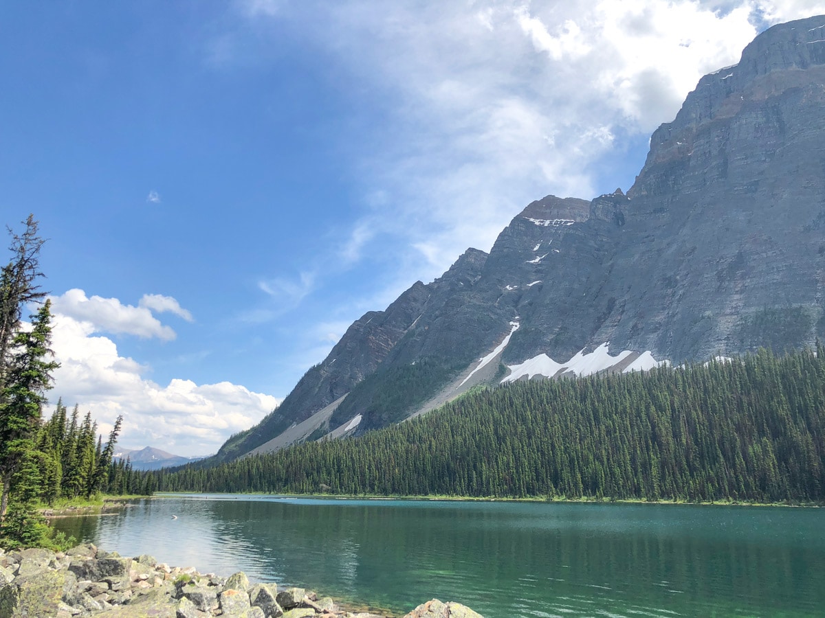 Beautiful peaks along the lake on the Boom Lake Hike near Banff, Alberta