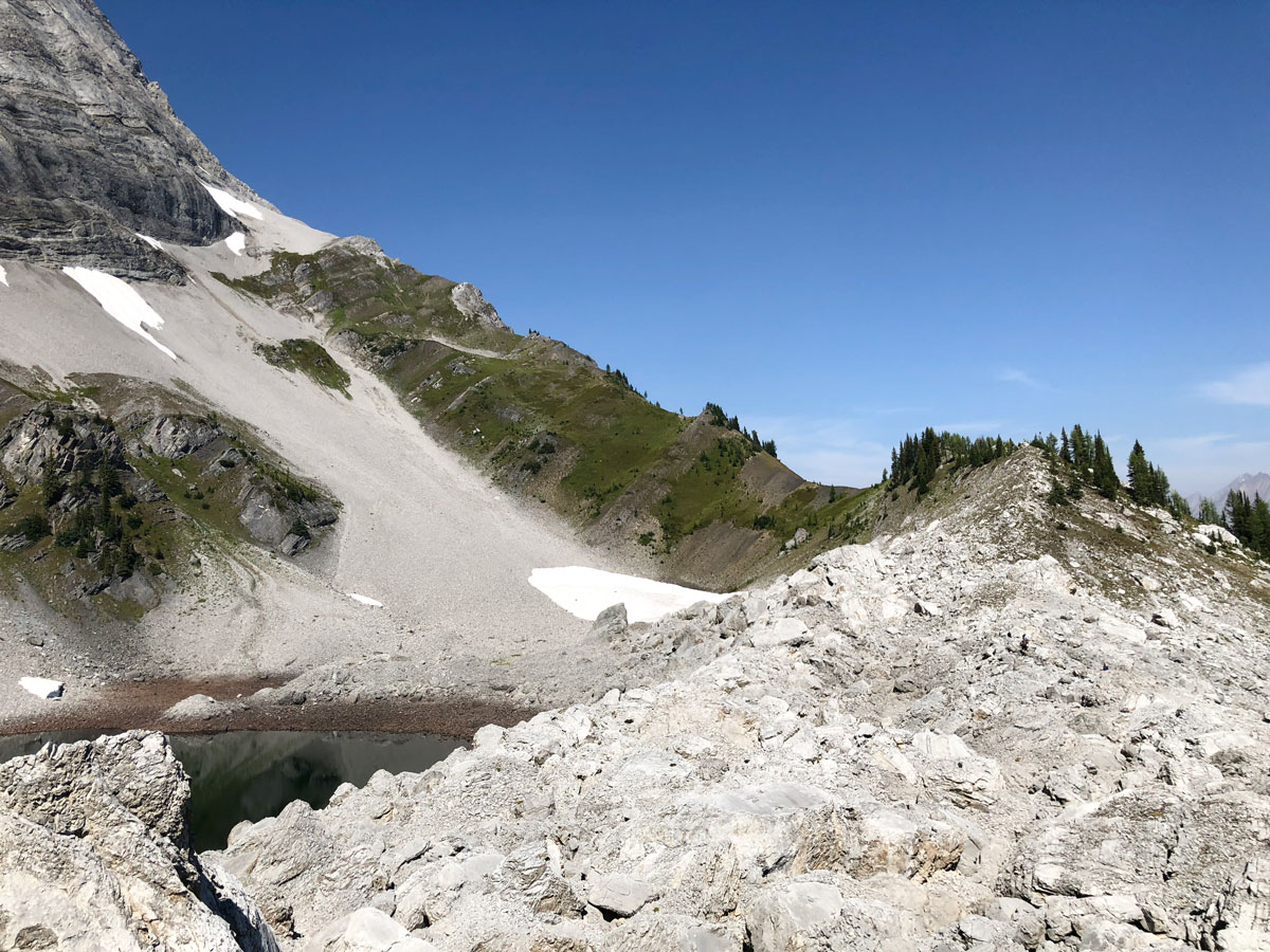 Hiking along the ridge on the Black Prince Lakes and Cirque Hike near Smith-Dorrien Trail in Kananaskis, near Canmore