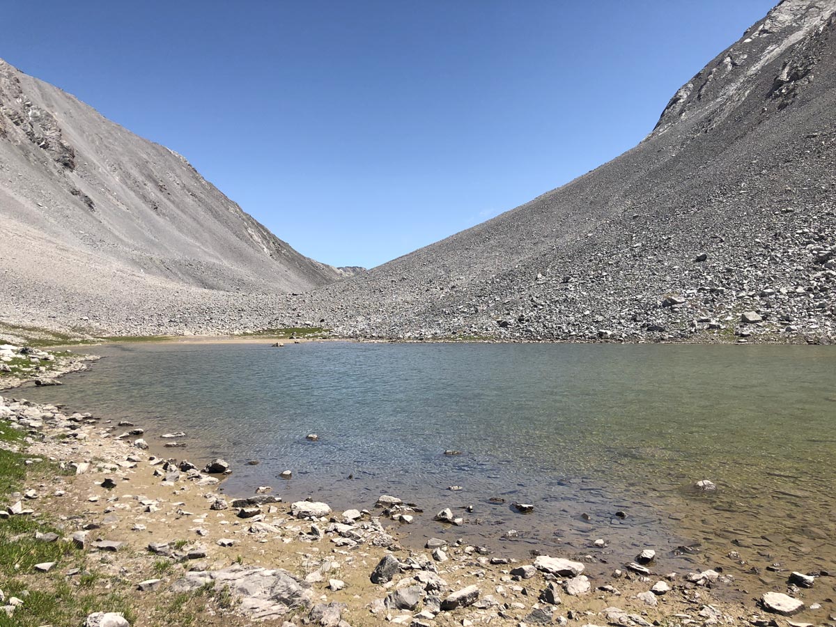 Rummel Pass Hike near Smith-Dorrien Trail in Kananaskis leads along beautiful tarn