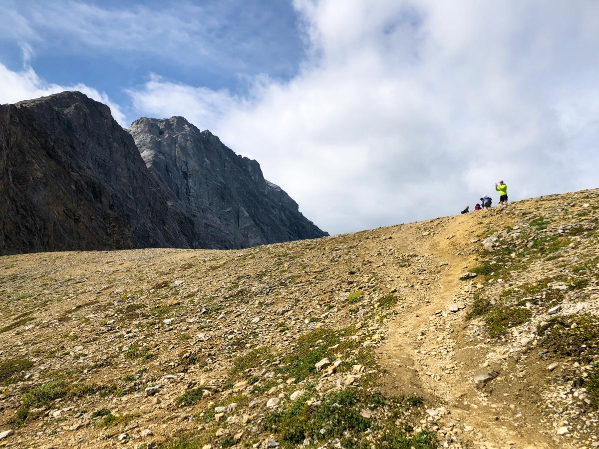 Hikers taking pictures from the Guinn's Pass Hike in Kananaskis, near Canmore