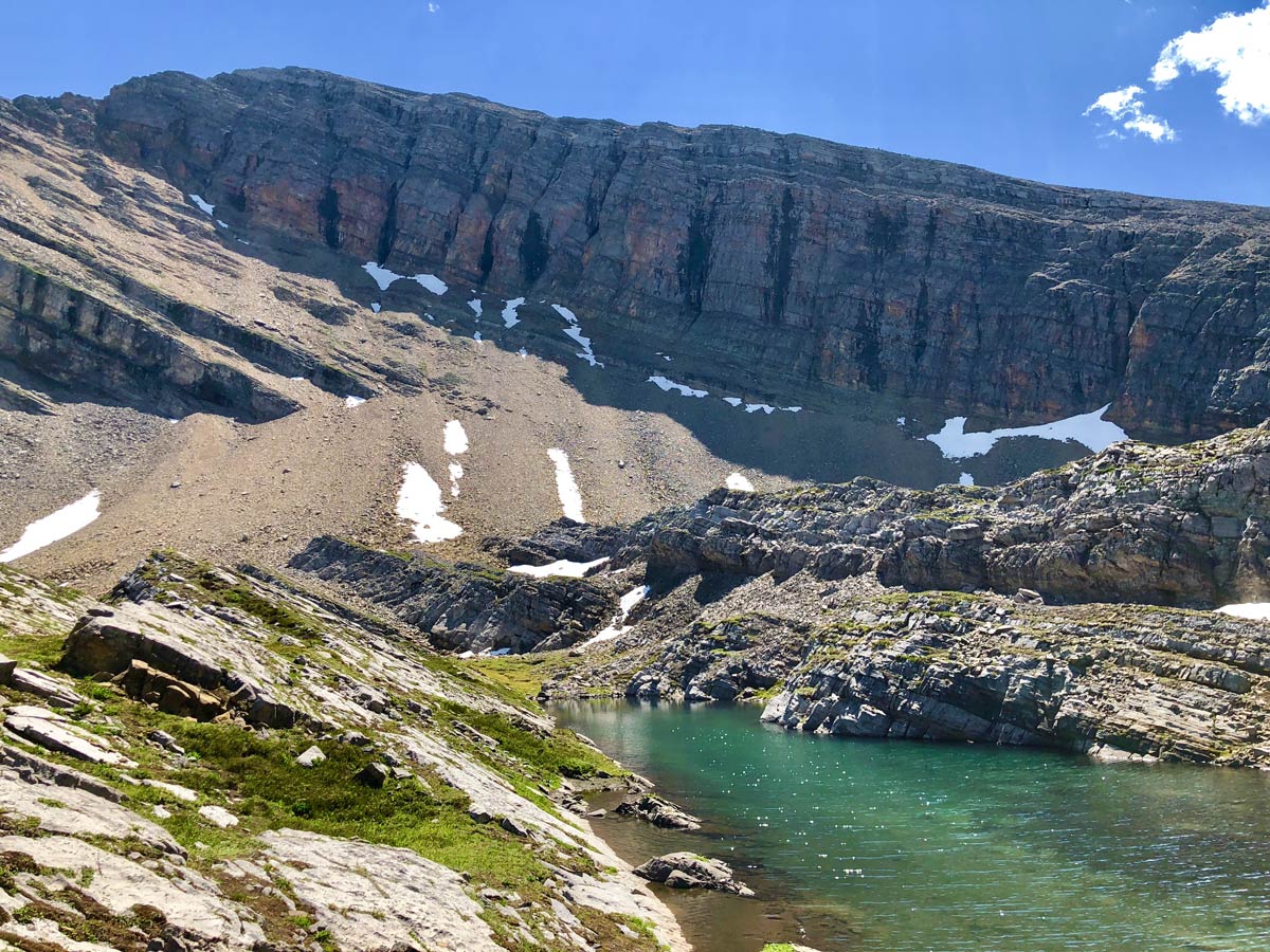 Blue tarn on the Sparrowhawk Tarns Hike near Smith-Dorrien Trail in Kananaskis, near Canmore