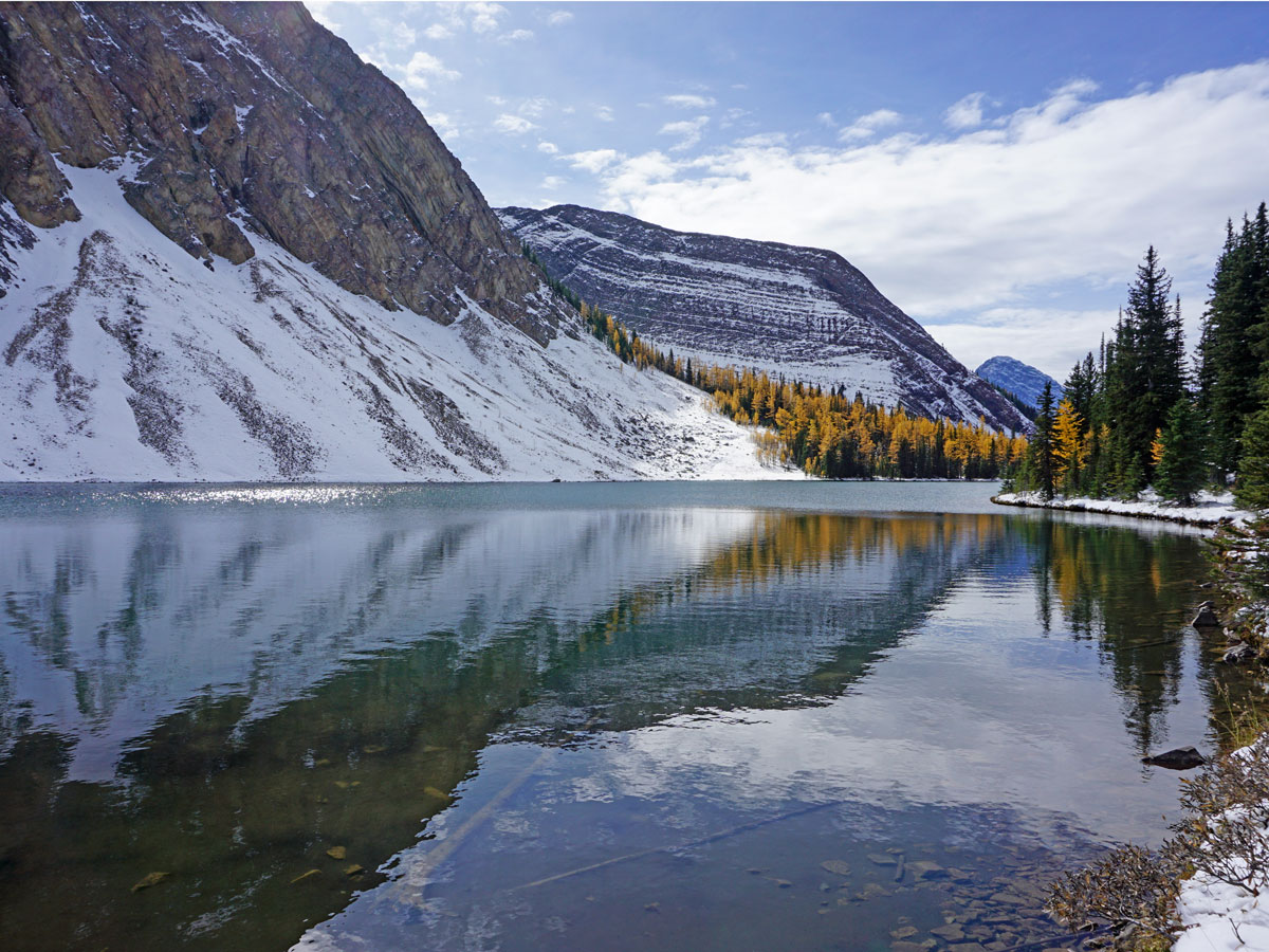 Calm lake on the Rummel Lake Hike near Smith-Dorrien Trail in Kananaskis, near Canmore