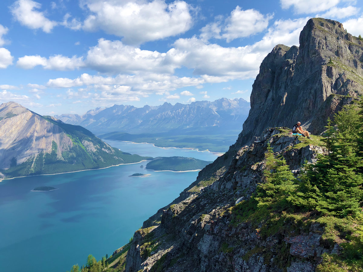 Hiker on top of the Sarrail Ridge via Rawson Lake Hike in Kananaskis, near Canmore