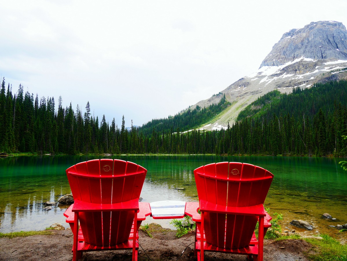 Red chairs on the Yoho Lake Hike in Yoho National Park, British Columbia