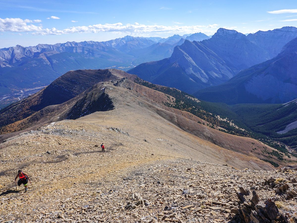 Hikers and mountains at Centennial Pass and Mount Allan Summit Hike in Canmore