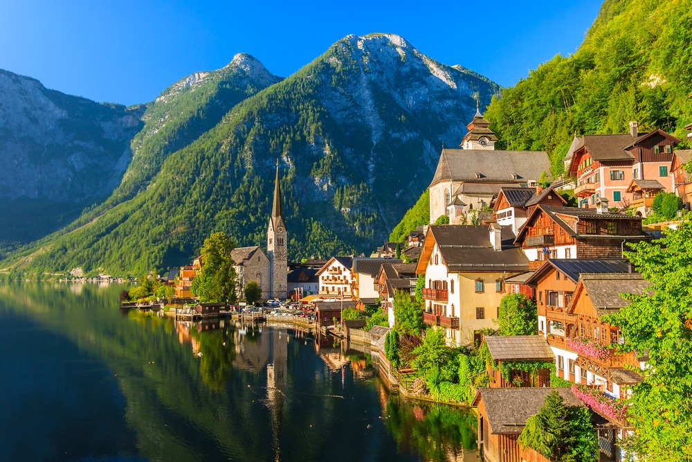 Famous Hallstatt mountain village and alpine lake should be included in your hiking trip to Austrian Alps