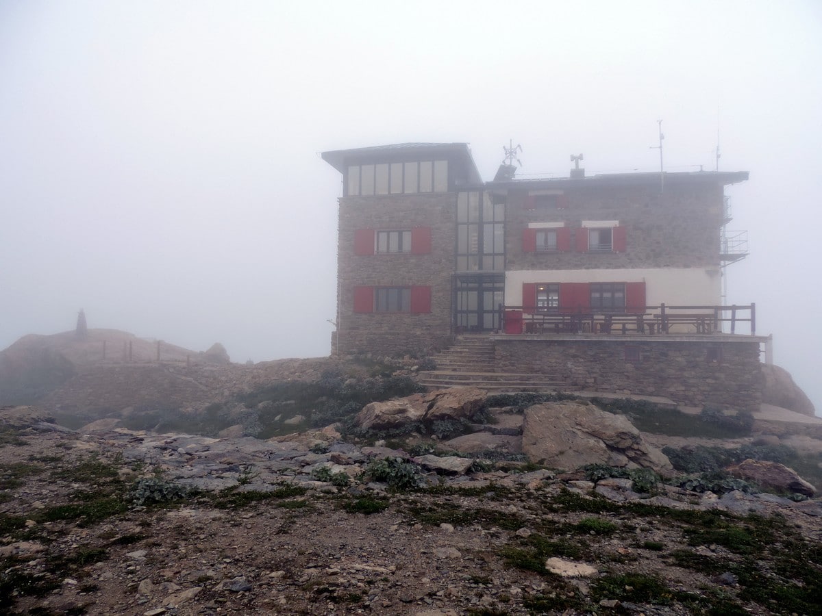 The hut in the fog on the Rifugio Remondino Hike in Alpi Marittime National Park, Italy