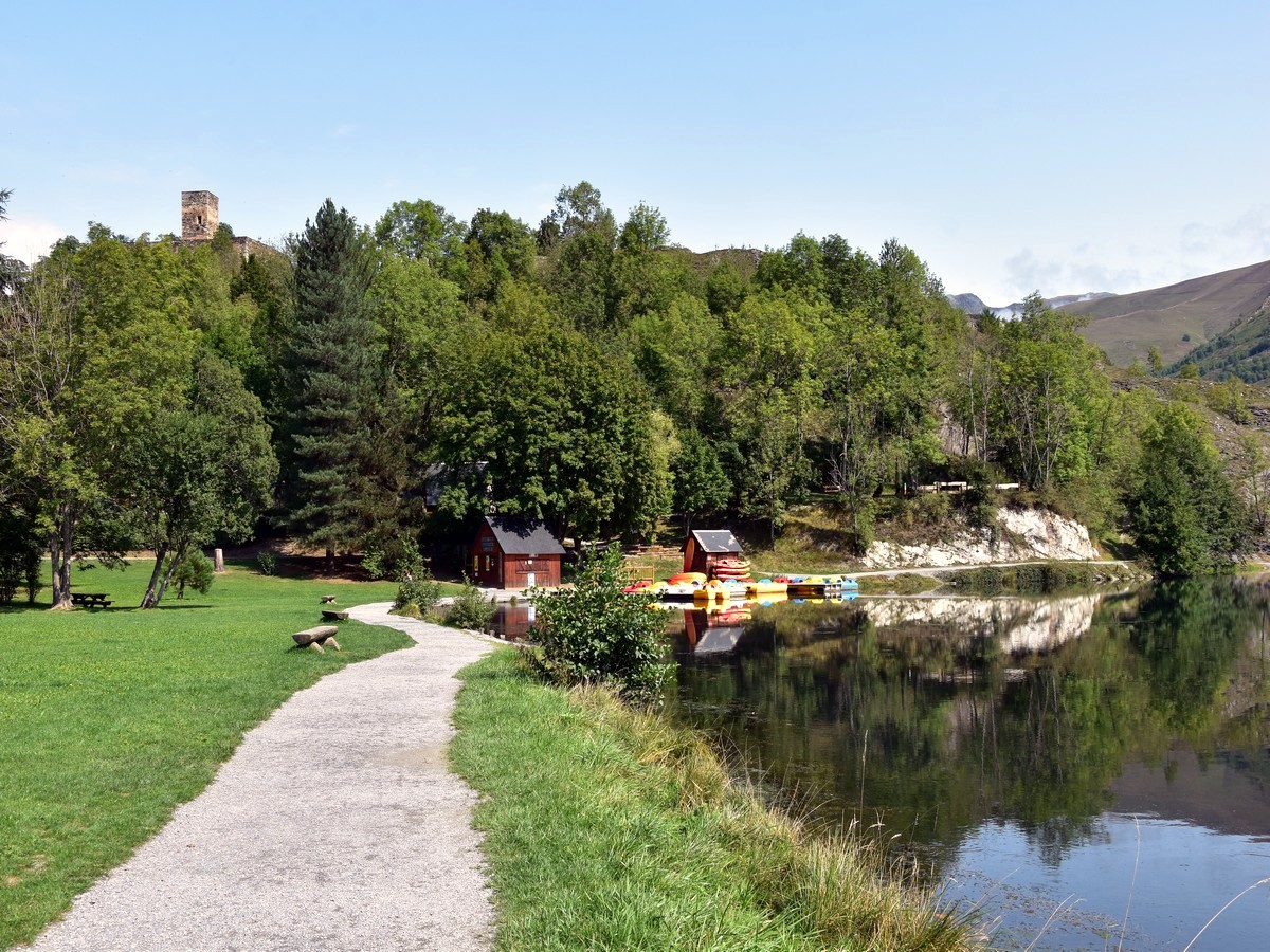 Reaching the foot of the castle's hill on the Lac de Loudenvielle Hike in French Pyrenees