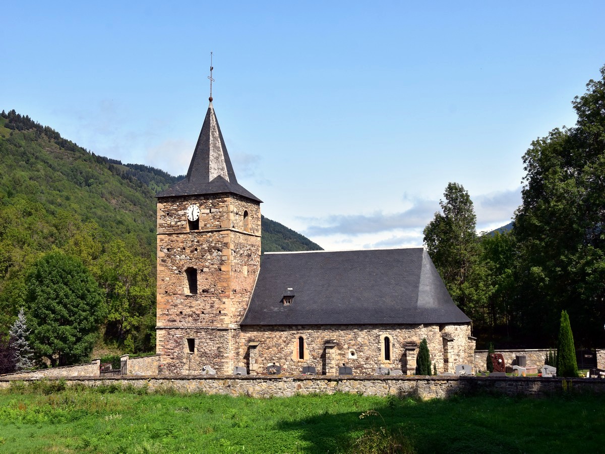 The 16th century church behind the castle on the Lac de Loudenvielle Hike in French Pyrenees