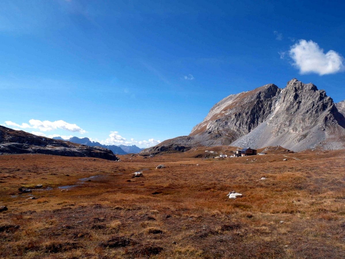 The refuge and the Aguille de la Vanoise on the Lac des Vaches and Col de la Vanoise Hike in Vanoise National Park in France