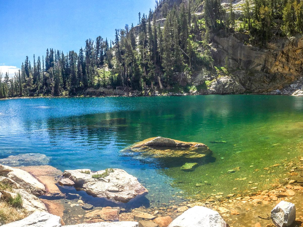 Beautiful blue lake at Hanging Canyon Hike in Grand Teton National Park