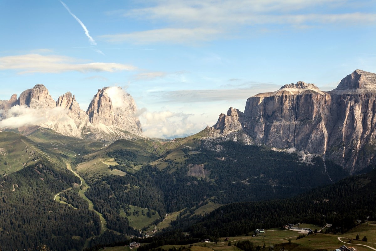 Sassolungo massif on the left, Sella Towers on the right as seen from the Viel del Pan Marmolada Hike in Dolomites, Italy