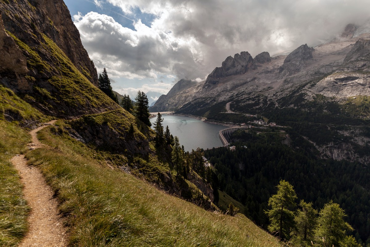 The path which leads to the Fedaia Lake on the Viel del Pan Marmolada Hike in Dolomites, Italy