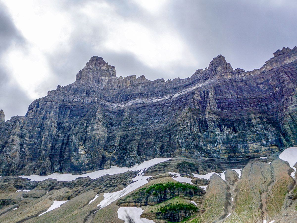 Iceberg Lake trail in Glacier National Park is surrounded by beautiful peaks
