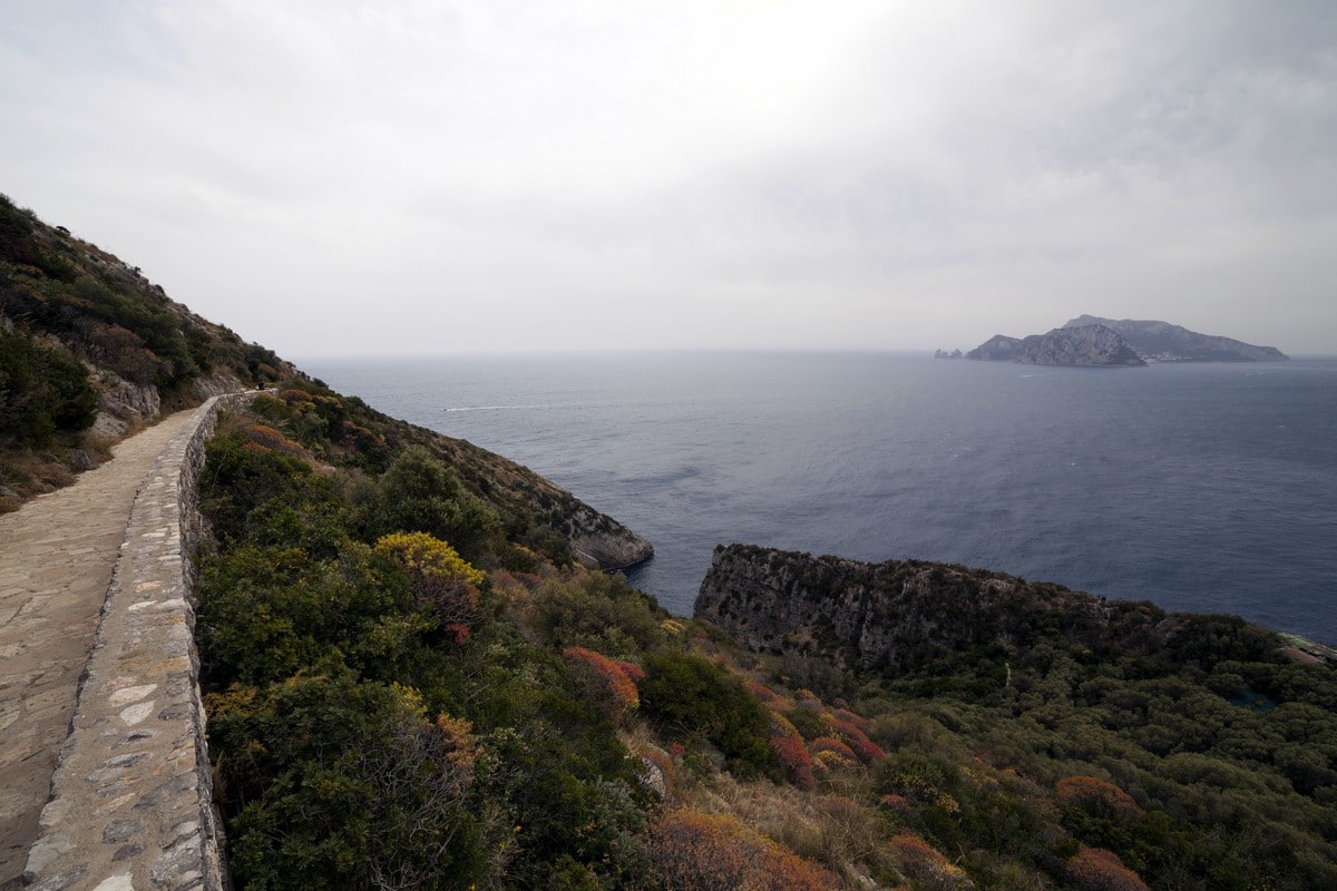 Capri and the trail of the Punta Campanella Hike in Amalfi Coast, Italy