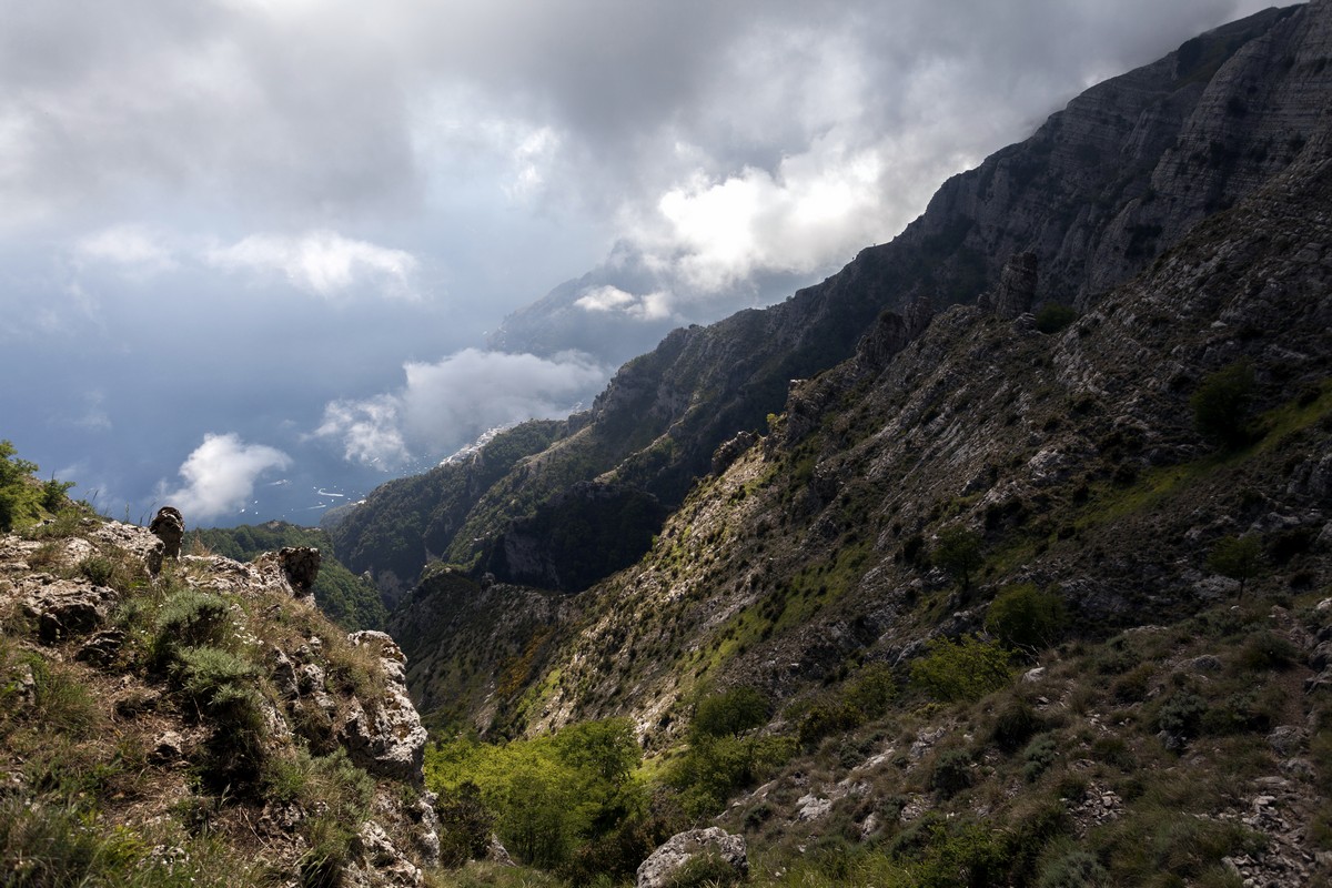 Old landslide and Positano behind the mountain from the Monte Canino Hike in Amalfi Coast, Italy