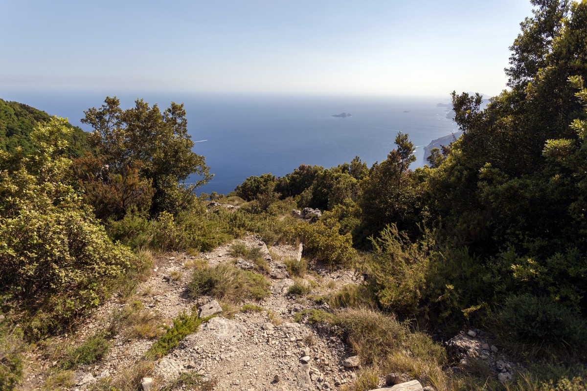 Stairs with a view on Amalfi Coast and Li Galli archipelago from the High Path of the Gods Hike in Amalfi Coast, Italy