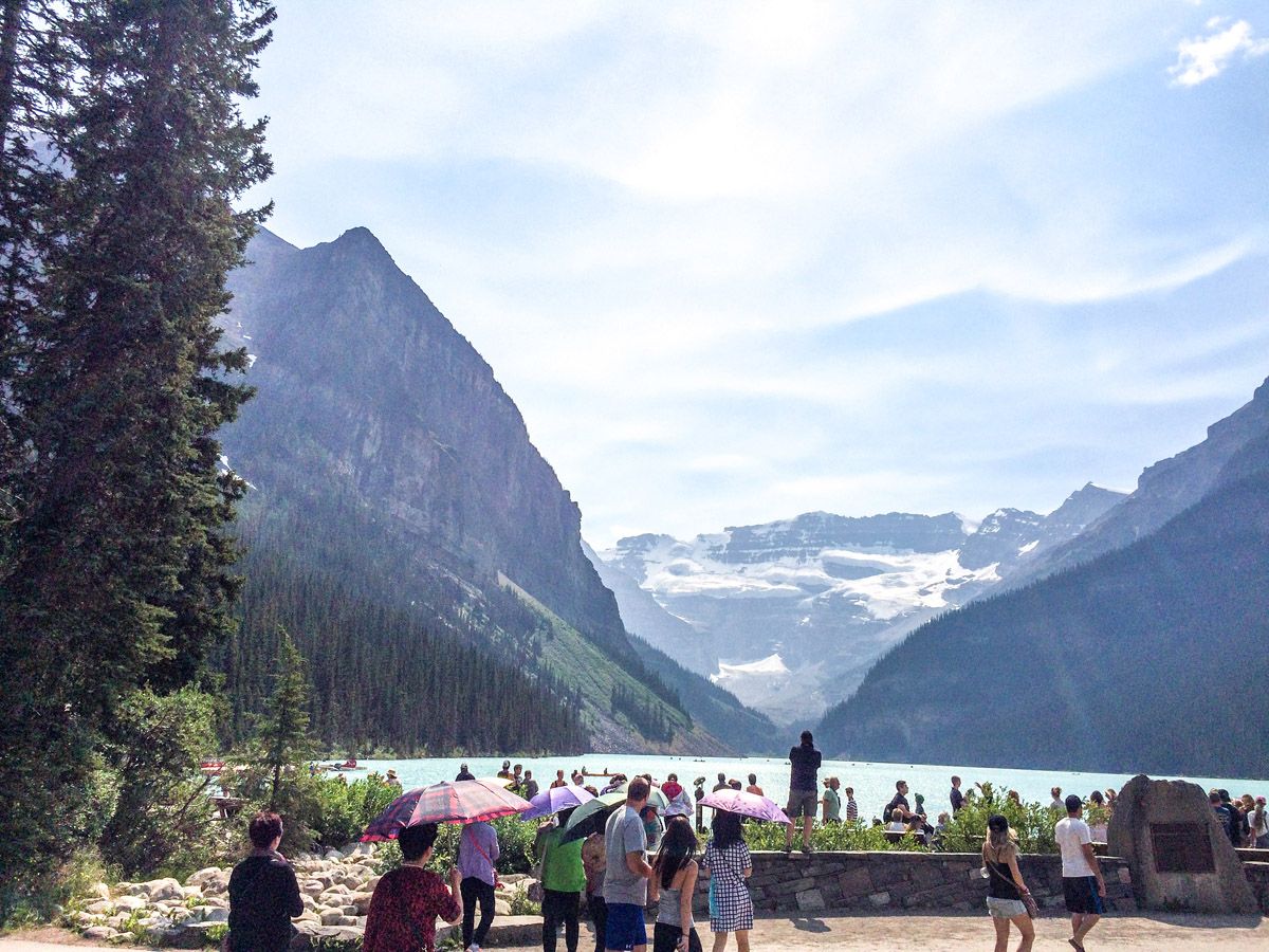 People on the trailhead of the Lake Agnes Tea House Hike in Lake Louise, Banff National Park