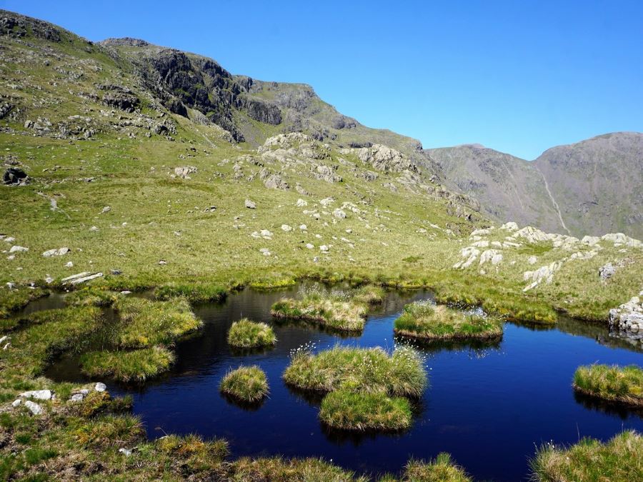 Small tarn near Red Pike from the Mosedale Horseshoe Hike in Lake District, England