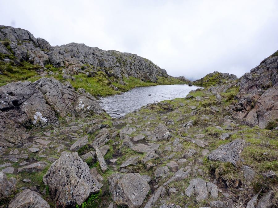 Small mountain tarn on the Haystacks Hike in Lake District, England