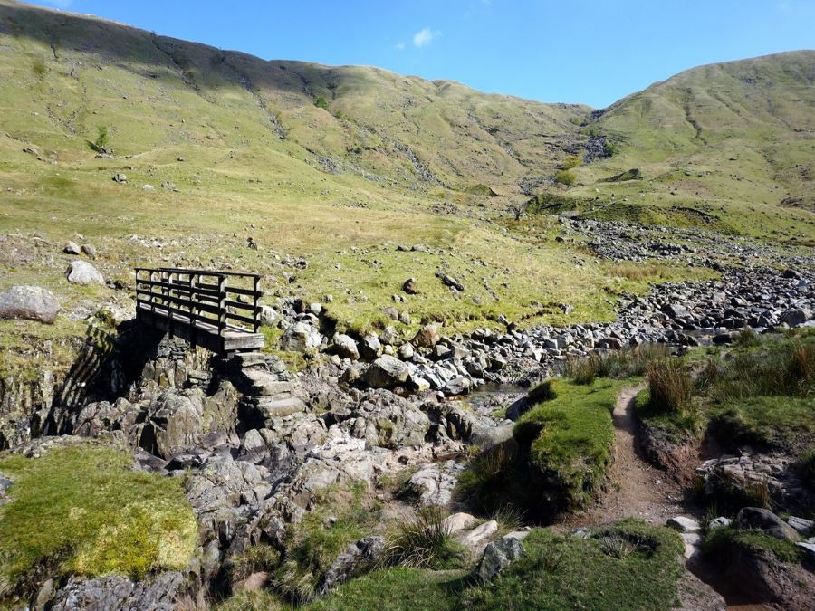 A bridge over a stream on the Langstrath Valley Hike in Lake District, England