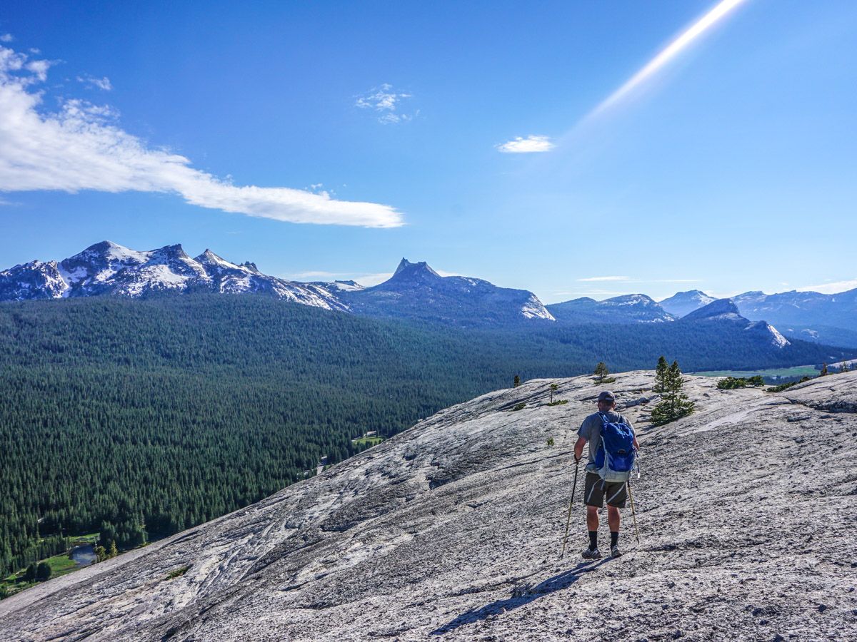 Man with hiking gear on the Lembert Dome Hike in Yosemite National Park, California