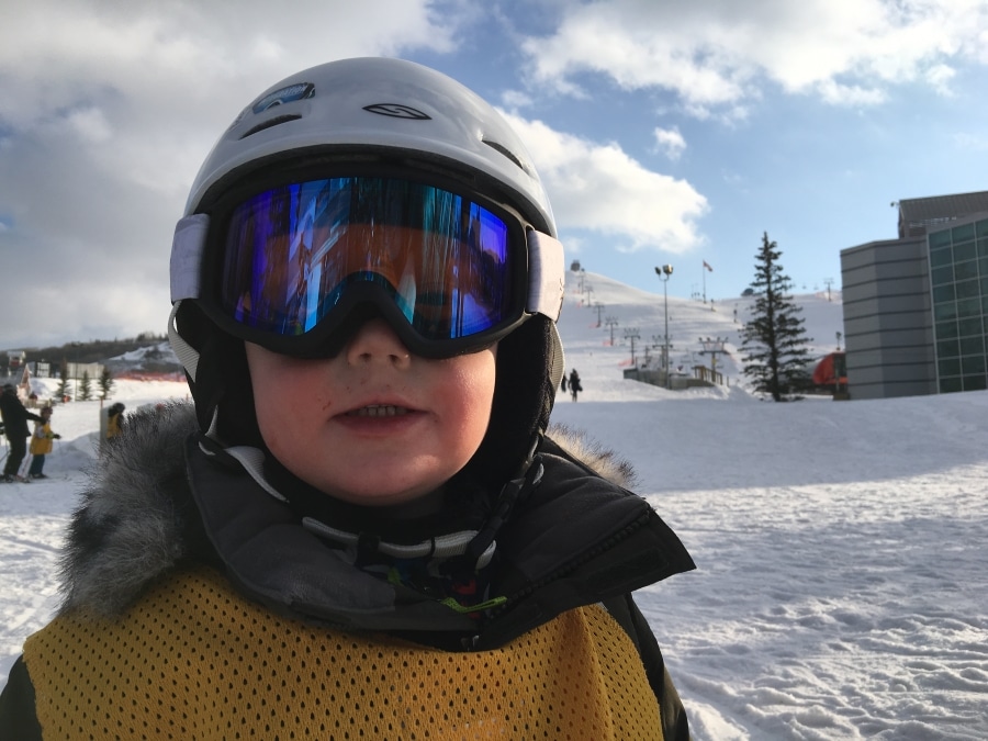 Boy on his first skiing lesson in Banff National Park