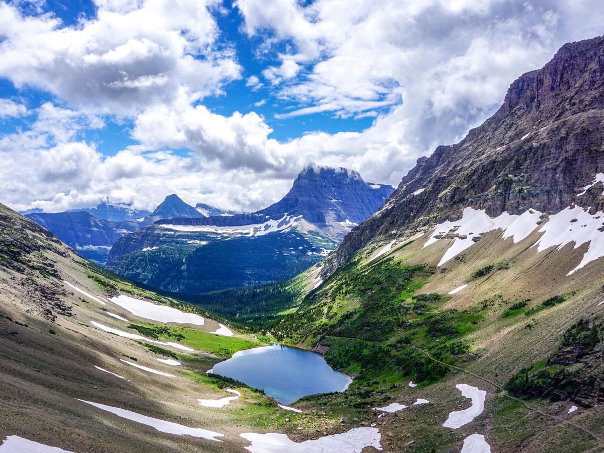 Beautiful tarn at Ptarmigan Tunnel Hike in Glacier National Park