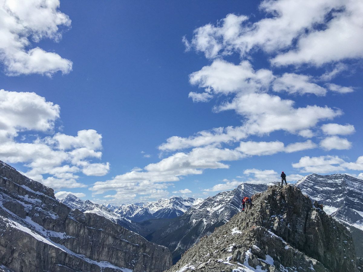 Hikers at the top of the Ha Ling Peak, Miners Peak & The Three Humps Hike from Canmore, the Canadian Rockies