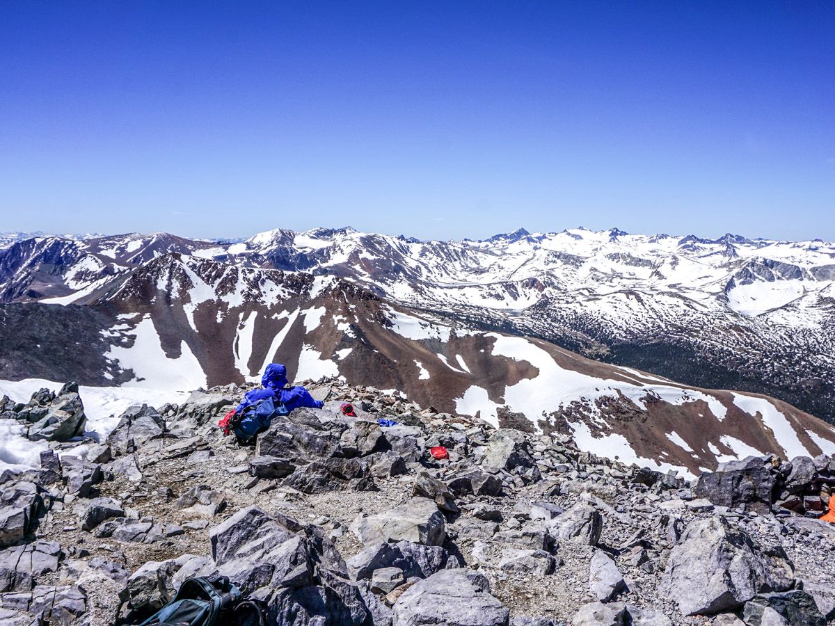 Hikers taking a break at Mount Dana Hike in Yosemite National Park