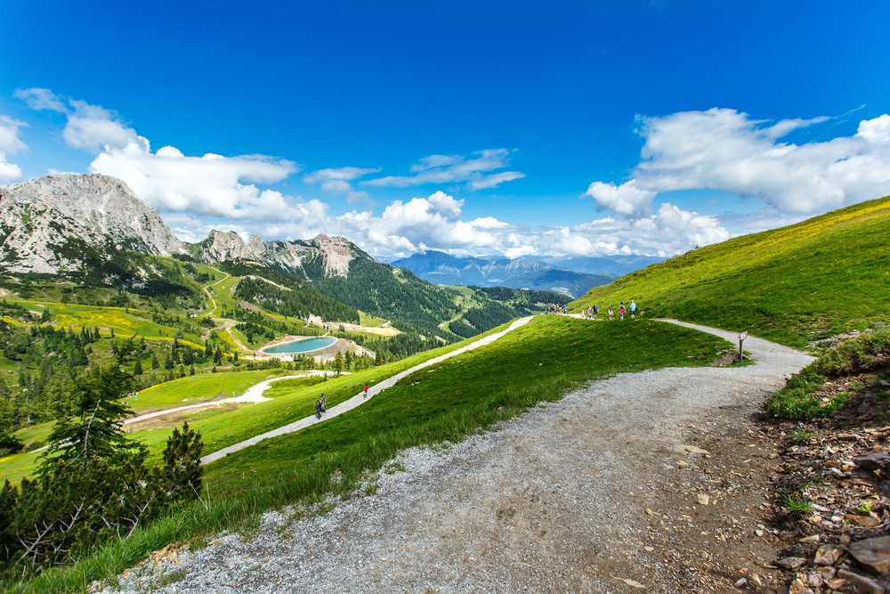 Hiking in Austrian Alps rewards with stunning panoramic views in summer