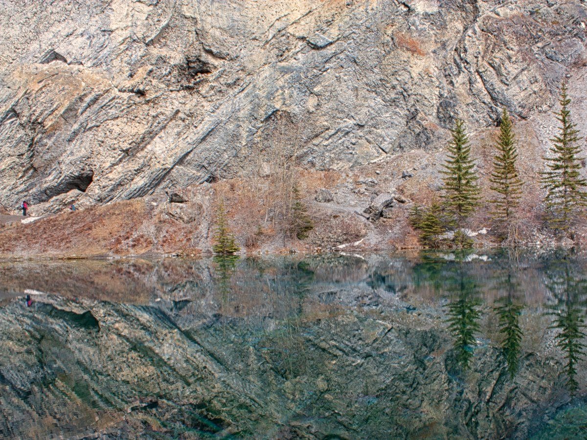 Reflections in the lake on the Grassi Lakes Circuit Hike in Canmore, the Canadian Rockies