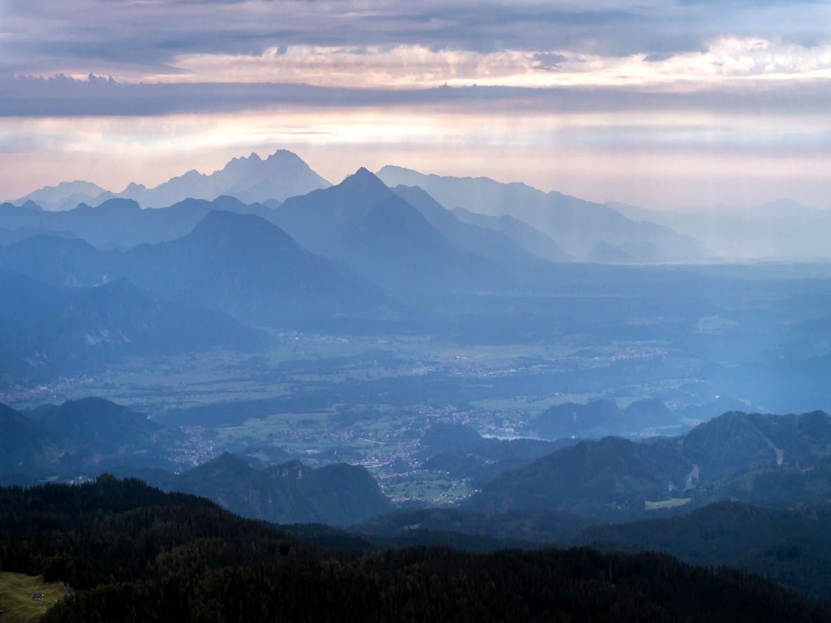 Misty atmosphere on Debela Peč trail in Julian Alps, Slovenia