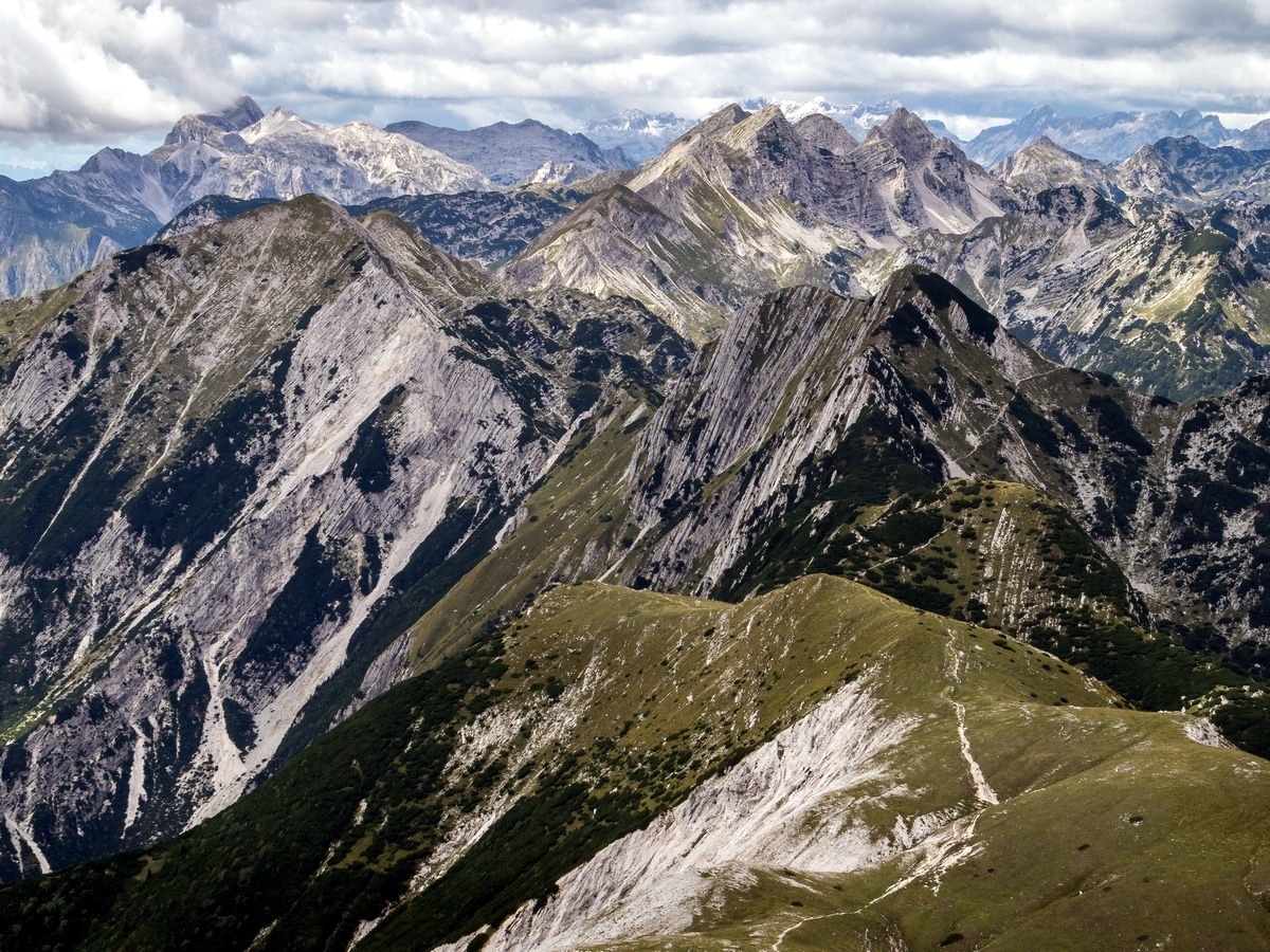 Views west towards Mount Krn and south Bohinj mountains as seen from the Vogel and Rodica Hike in Julian Alps, Slovenia