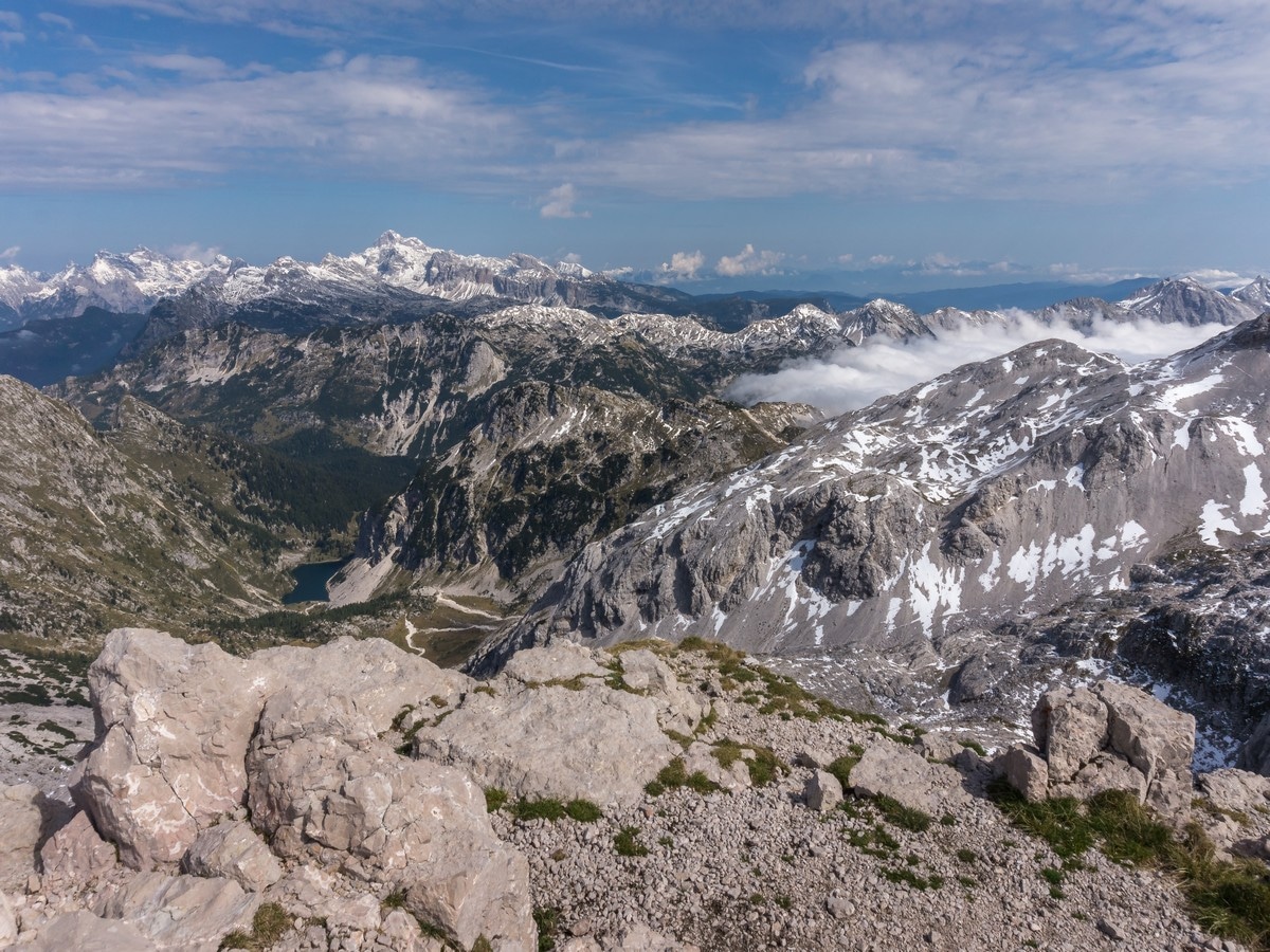 Mount Triglav and Krn Lake from the top of the battlefield of Mount Krn Hike in Julian Alps, Slovenia