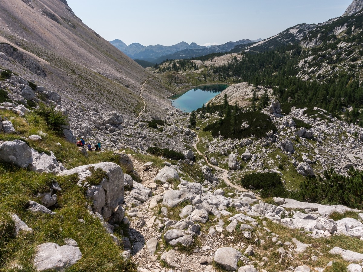Descend to the Jezero v Ledvicah Kidney lake on the Valley of The Seven Lakes Hike in Julian Alps, Slovenia
