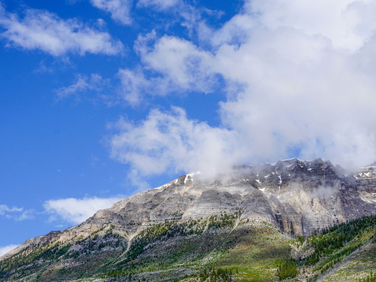 Clouds on the mountain top on the Stanley Glacier Hike in Kootenay National Park, Canadian Rocky Mountains