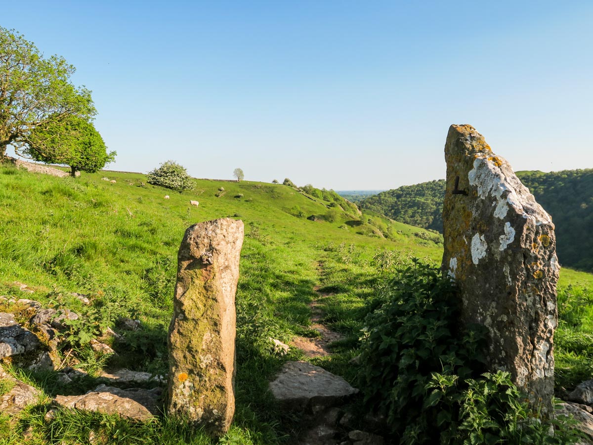 Millstone pillars on the high path of the Dovedale Circular Hike in Peak District, England