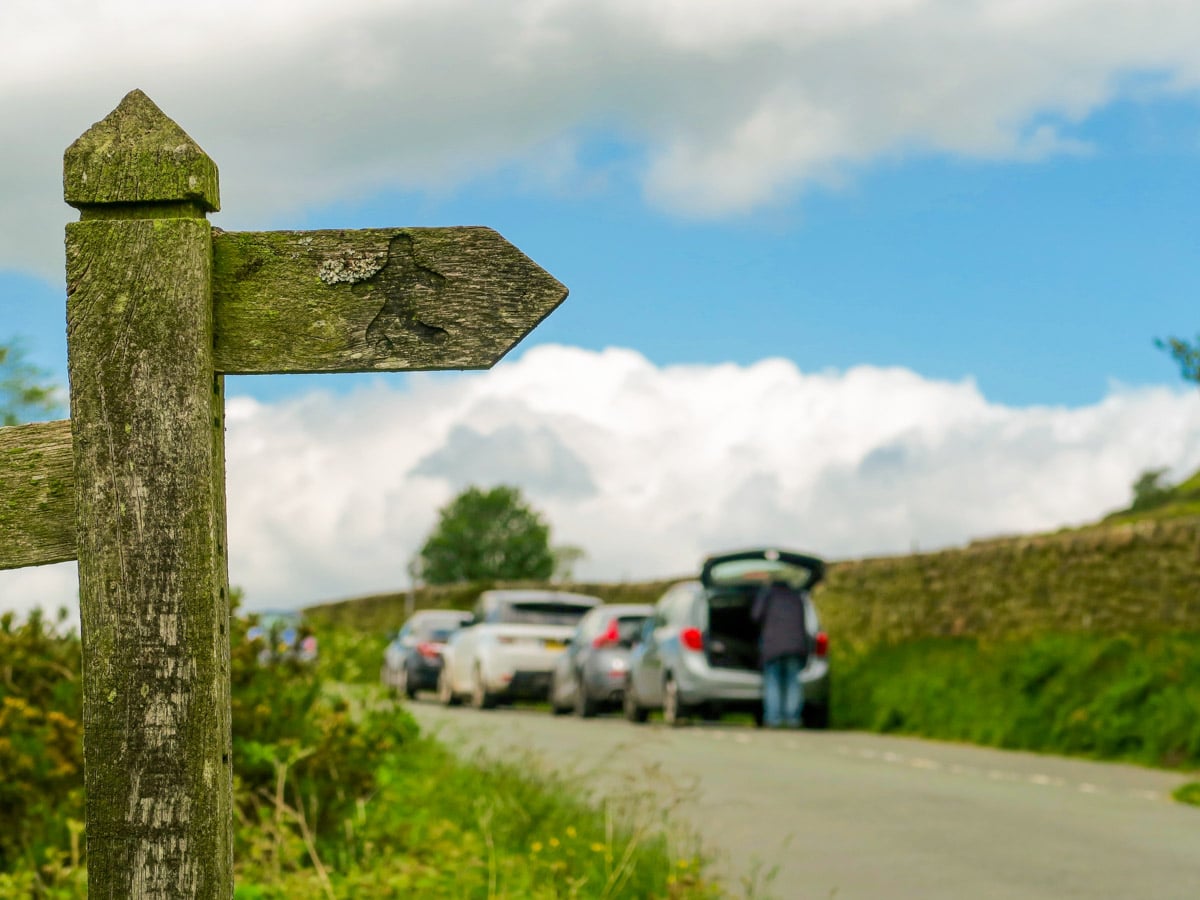 Signpost to the trailhead of The Roaches and Lud's Church Hike in Peak District, England