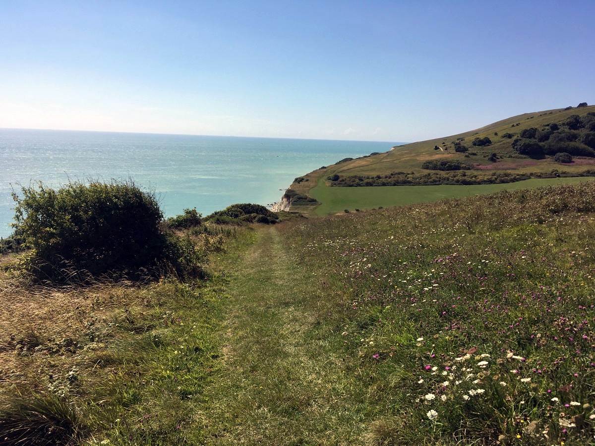 The trail into Whitebread hole on the East Dean, Beachy Head and Birling Gap Hike in South Downs, England