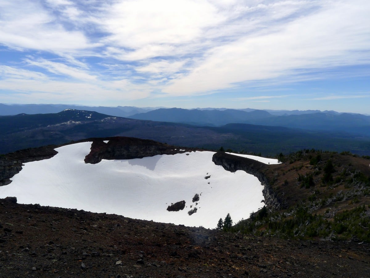 The Crater filled with snow on the Belknap Crater Hike near Bend, Oregon
