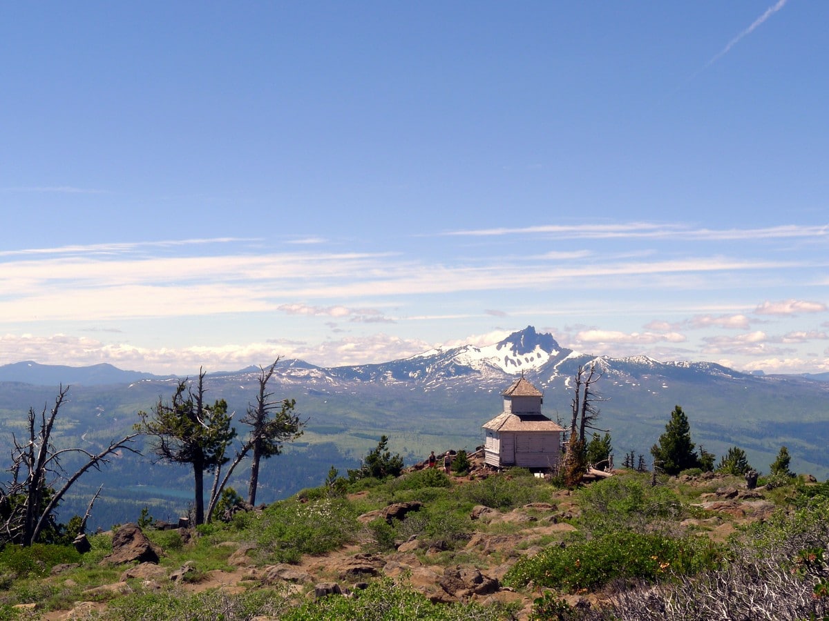 Historic shack with Mt Washington in the background on the Black Butte Hike near Bend, Oregon