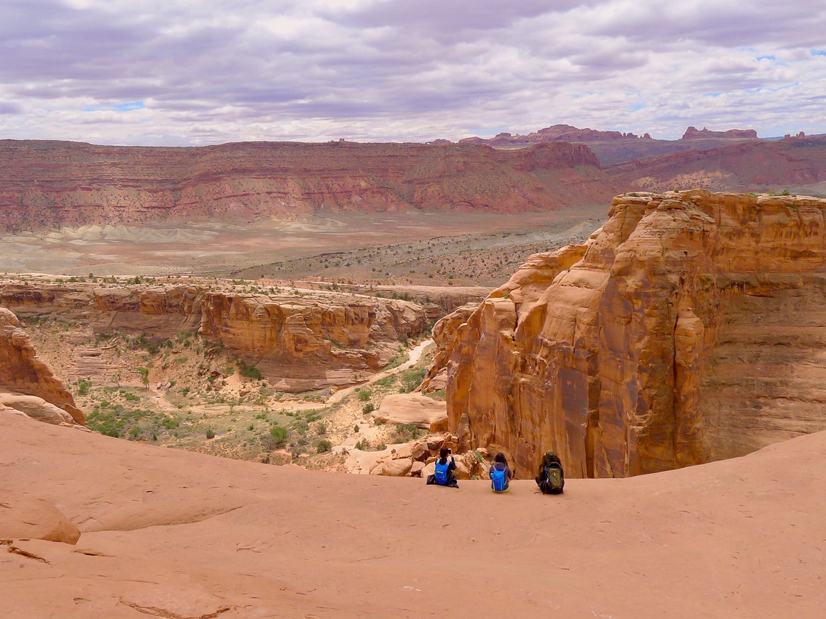 Delicate Arch hike in Arches National Park is surrounded by amazing scenery