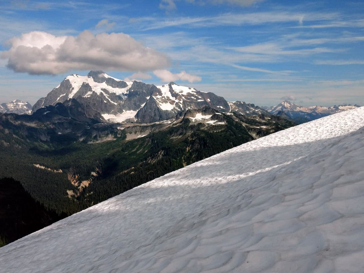 Mount Shuksan and snowfield on the Yellow Ptarmigan Ridge Hike near Mt Baker, Washington